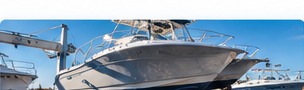 Boat on a lift undergoing full restoration