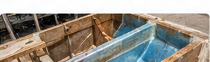 Open structural fiberglass hull under repair